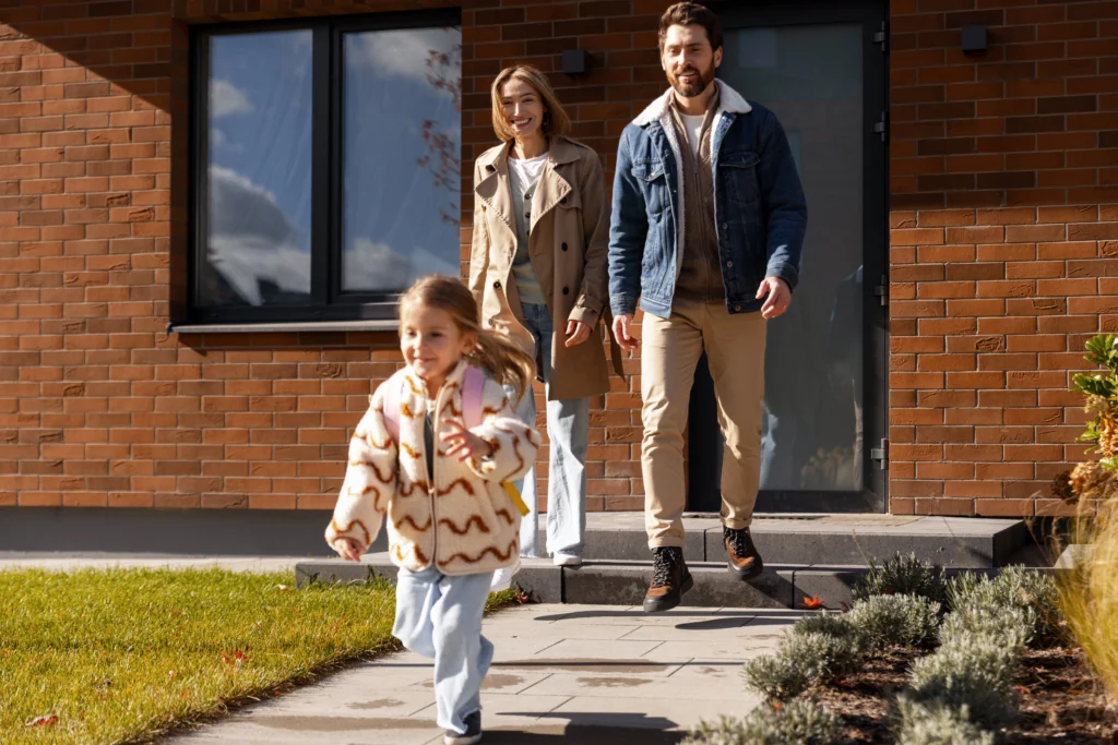 happy family leaving modern house for school day 2026 01 11 10 44 34 utc